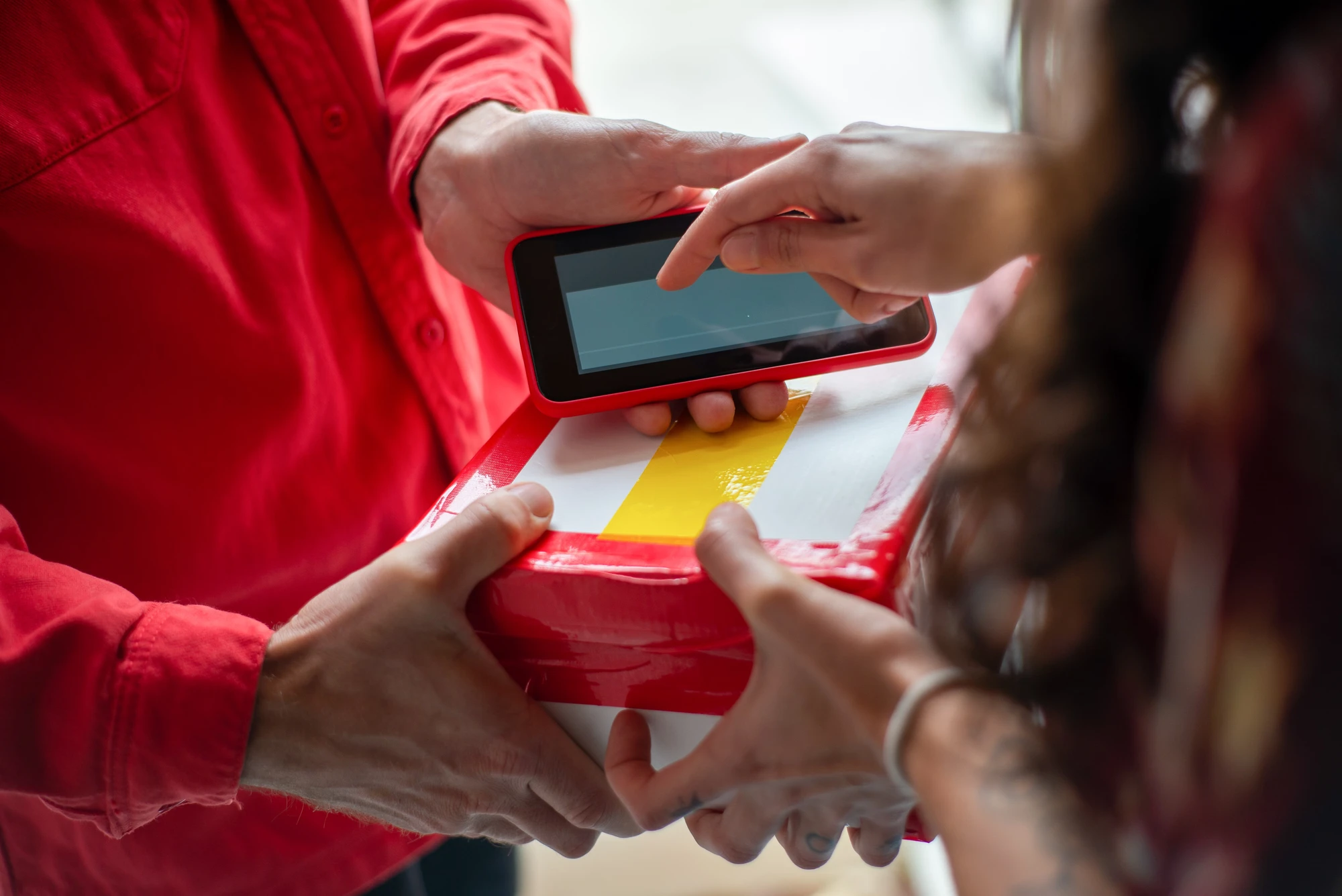 Operations team confirming an outbound order on a mobile terminal